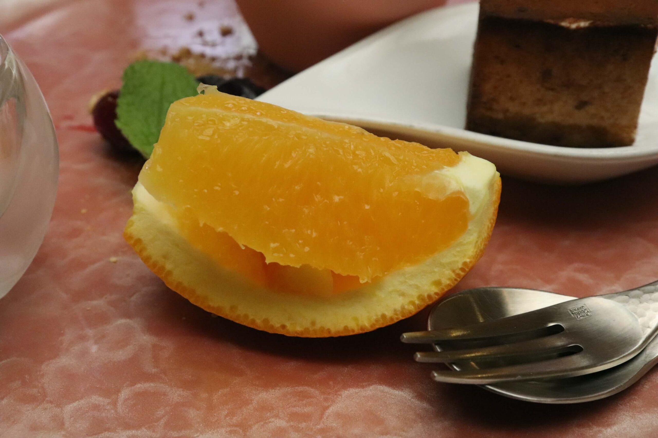 粋松亭の絆会席料理(夕食)の桃と梨のオレンジ